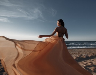 7 Sunset-Inspired Dresses To Wear All Summer Long