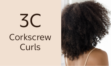 Back view of type 3C corkscrew curls hair pattern, labeled Corkscrew Curls.