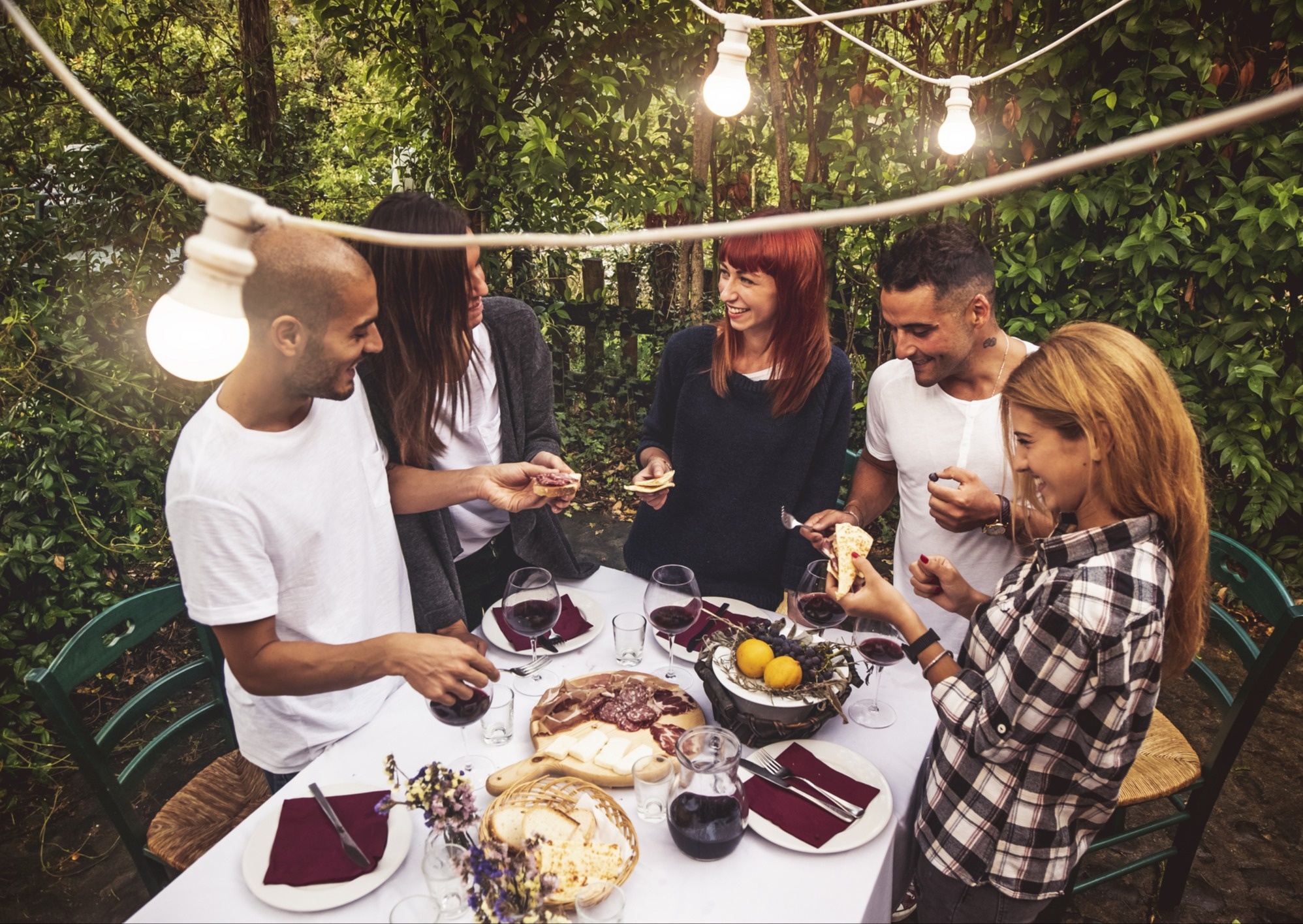 Friends having fun outside at a party