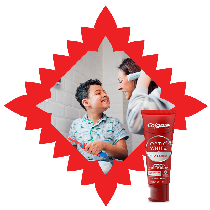 Mom and son brushing their teeth in a red frame with Colgate. / Mamá e hijo cepillándose los dientes en un marco rojo con Colgate.