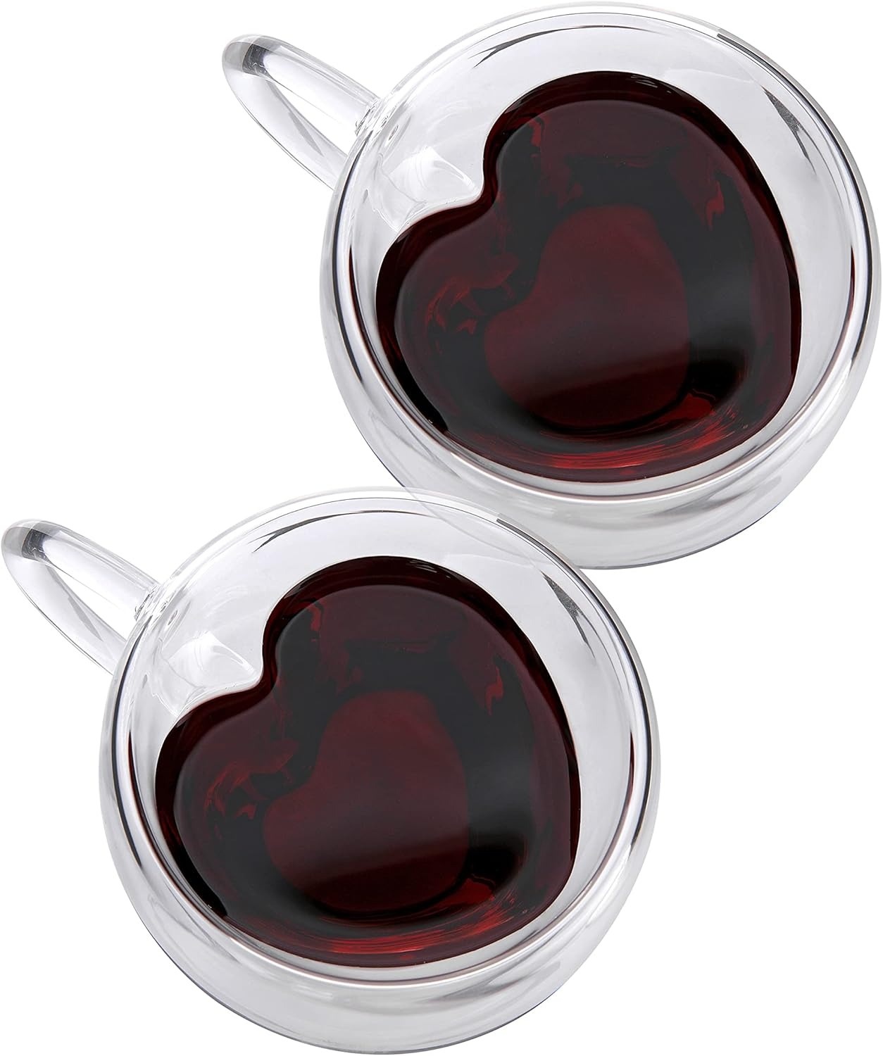 Overhead shot of 2 heart-shaped glass mugs filled with black coffee