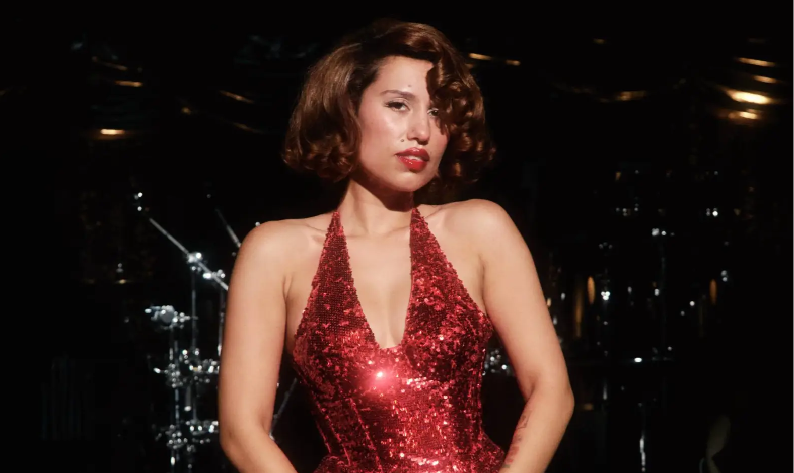 Woman in red sparkling dress.