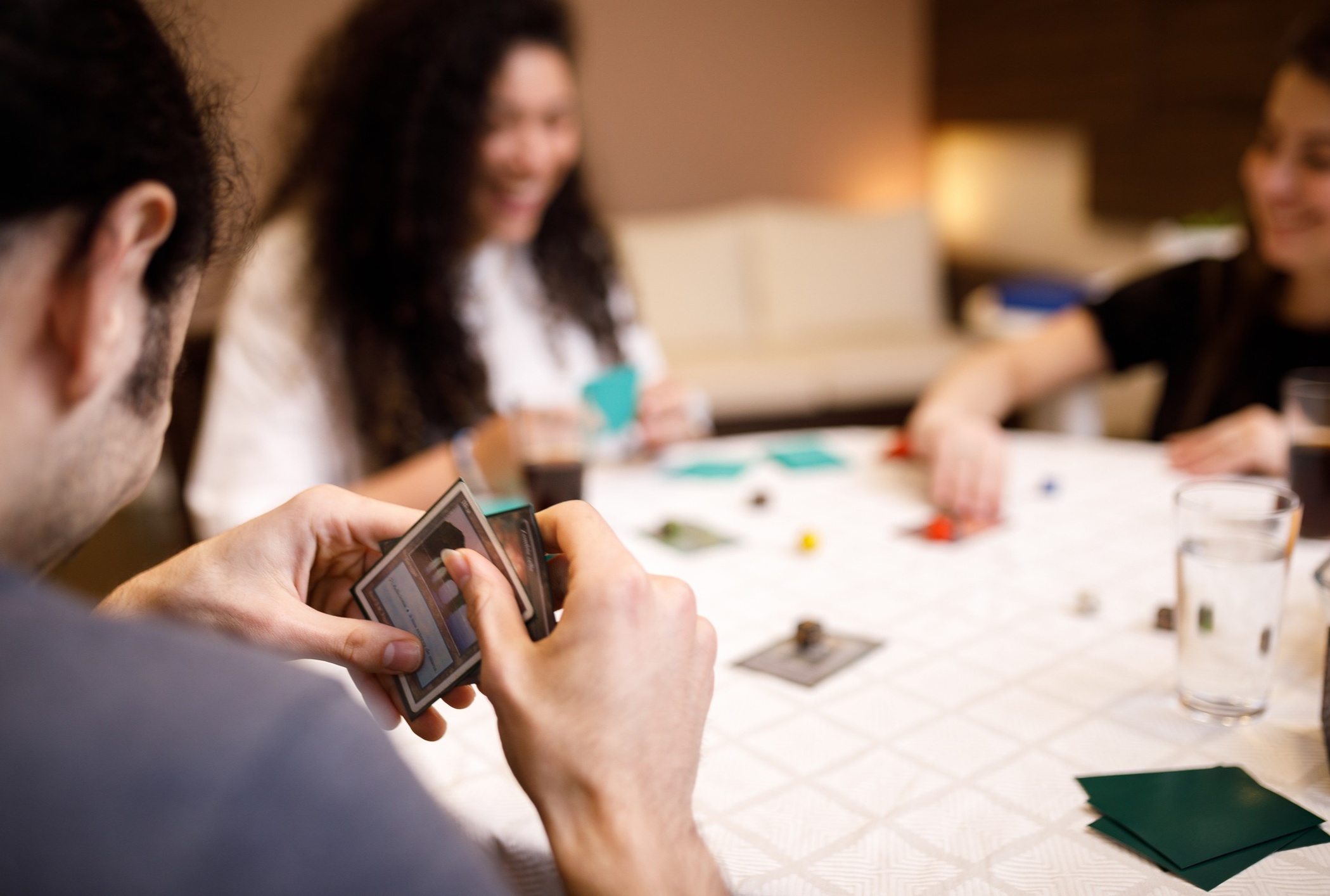 Friends playing a board game