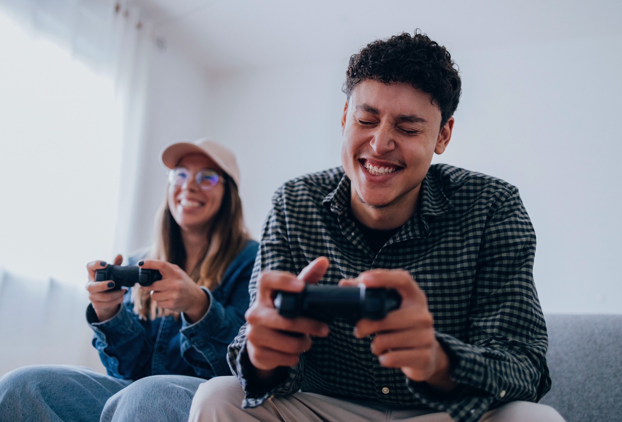 Two friends playing video games