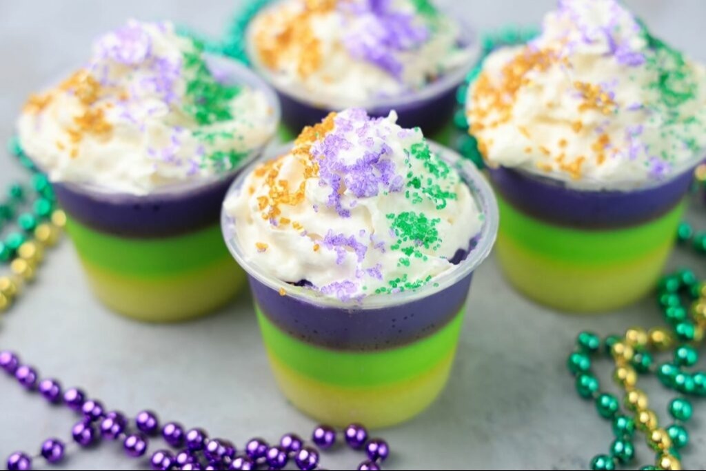 Four Mardi Gras-themed jello shots