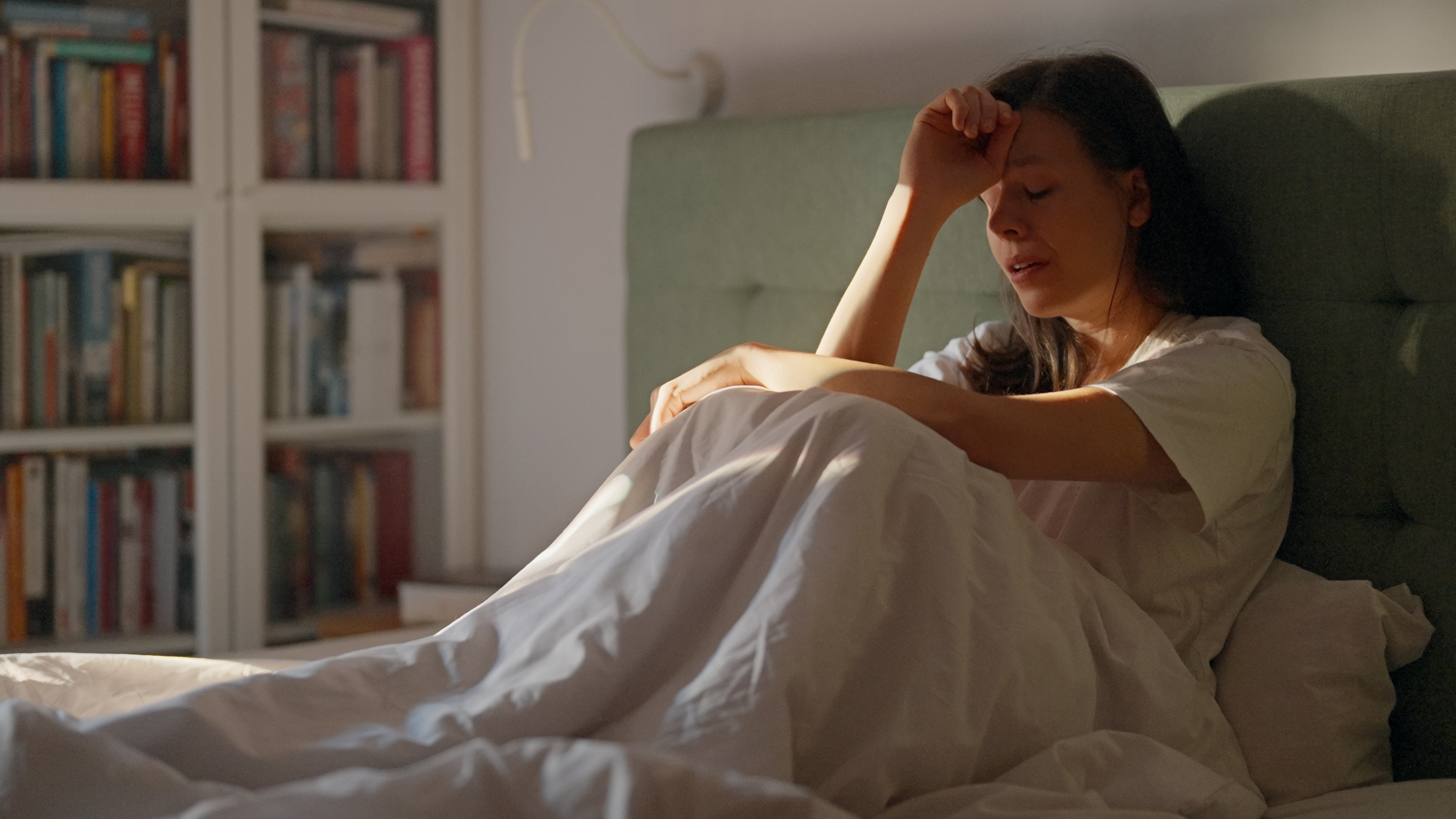Woman trying to fall sleep