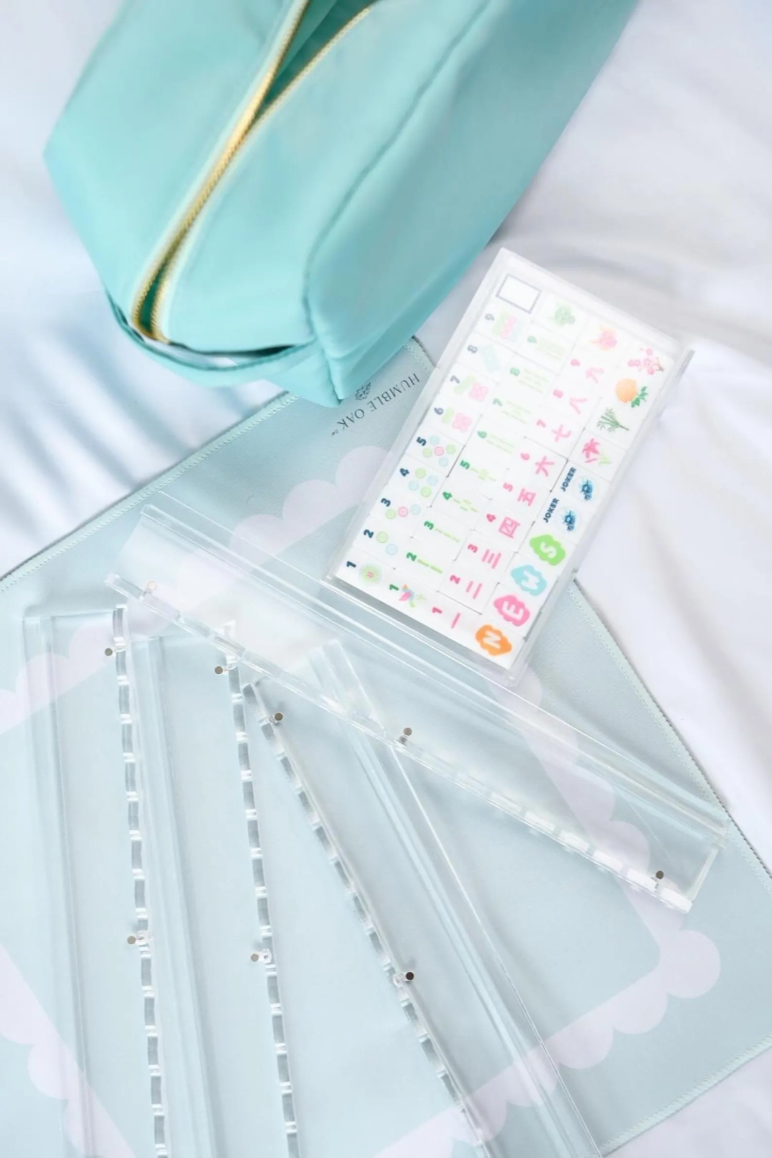 The Mini Set Mahjong Kit with Tiles, Acrylic Racks, Mat, and Bag