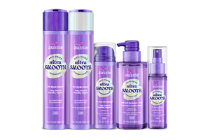 Aussie Anti-Frizz Ultra Smooth shampoo, conditioner, detangling gloss, jelly, and shine mist lineup.