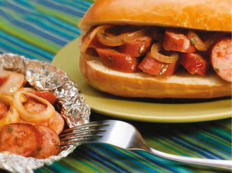 Spicy Sausage Foil Packet Recipe with a fork next to a sausage roll.