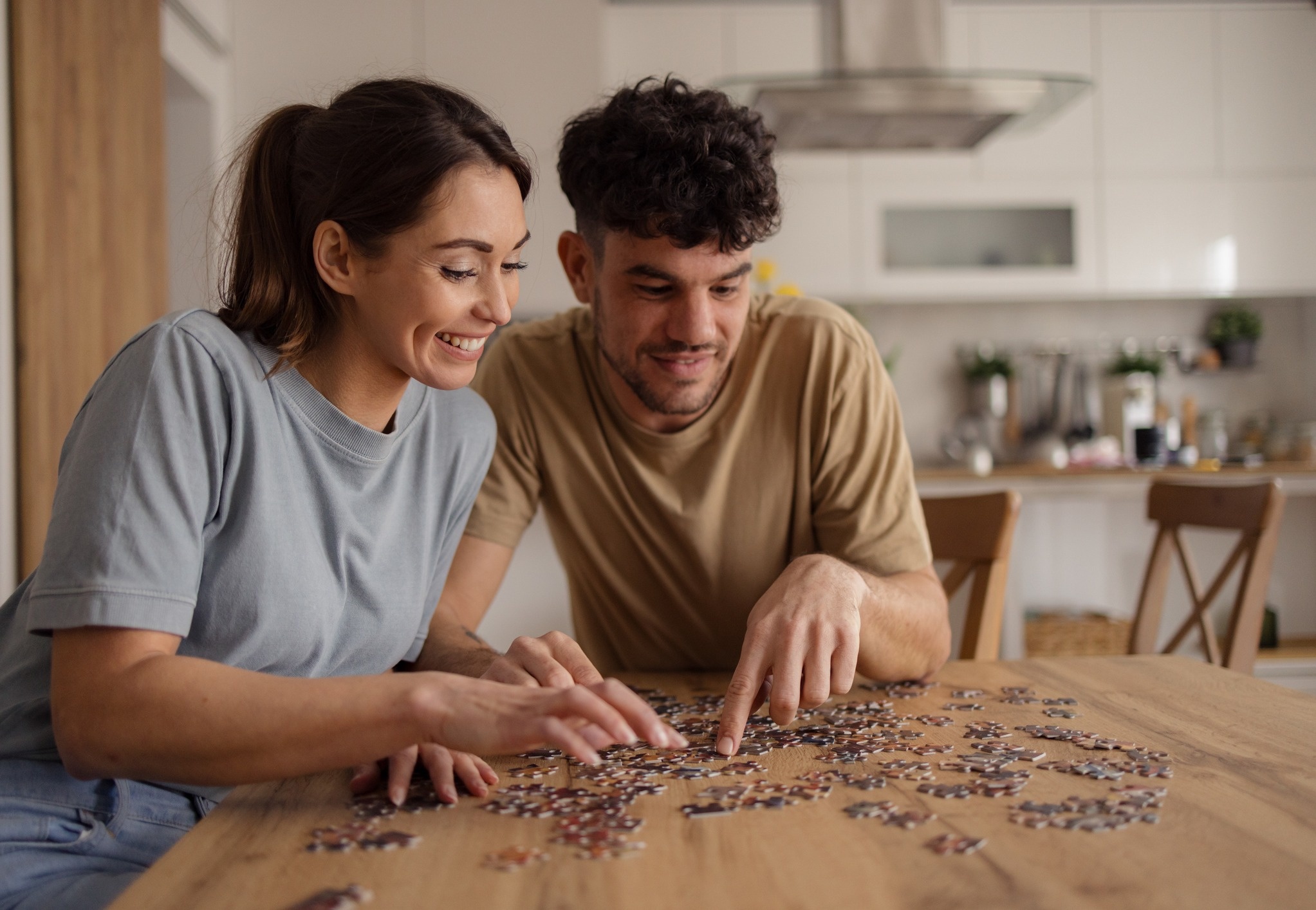 Woman and man doing a puzzle