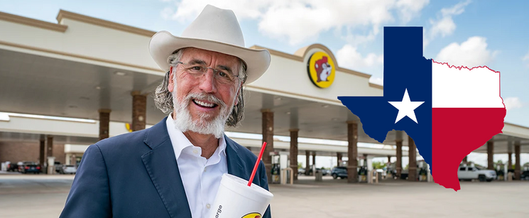 Person in cowboy hat in front of a modern Buc-ee’s.