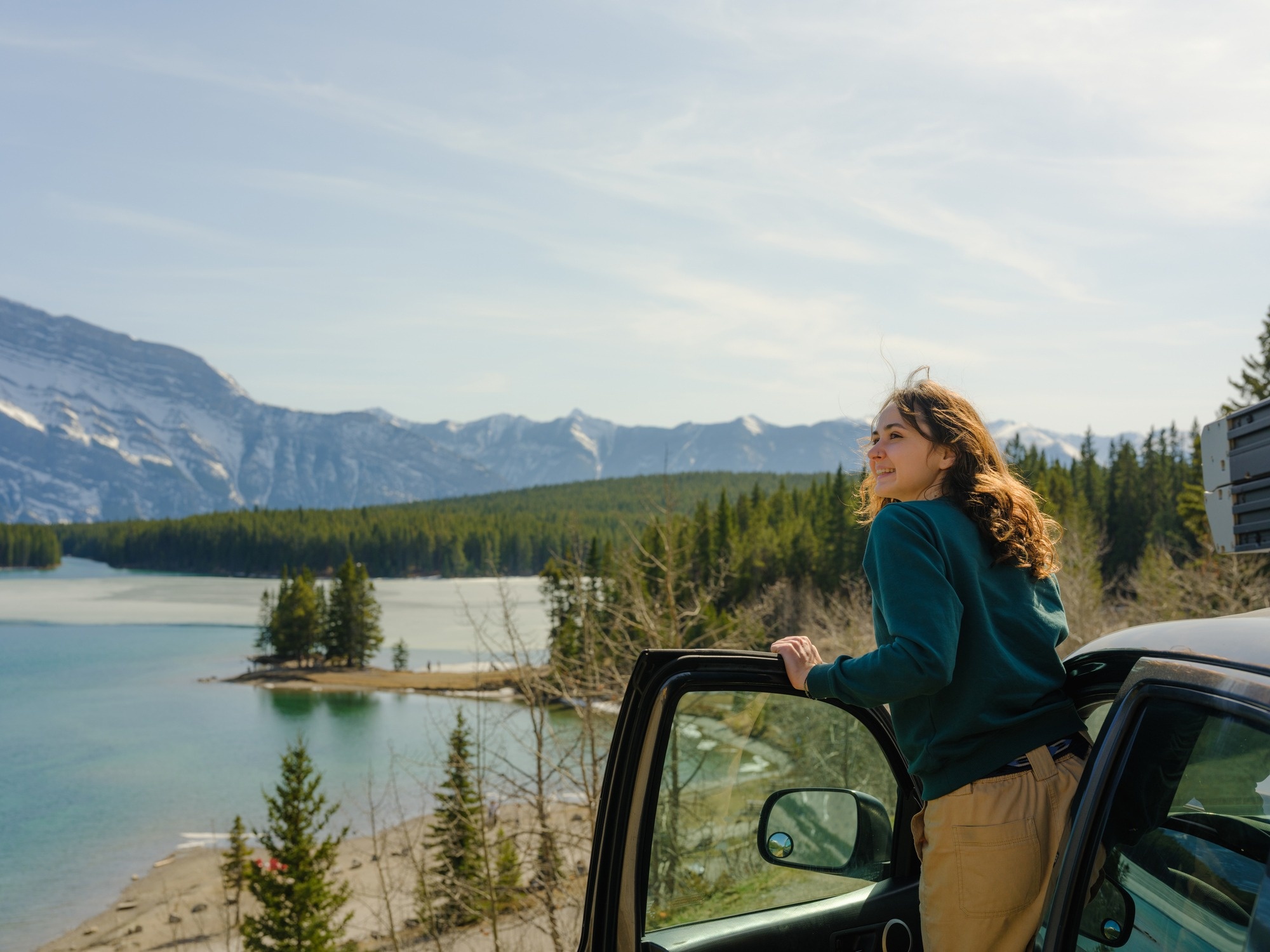 Woman looking at gorgeous landscape out of car